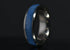 Azurite crystal titanium ring with vibrant blue stone band and polished silver edges by Sangreal Rings