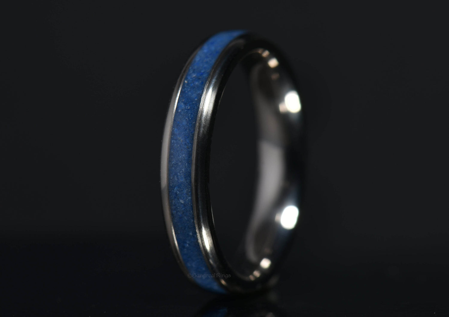 Azurite crystal titanium ring from Sangreal Rings with deep blue inlay and polished silver band