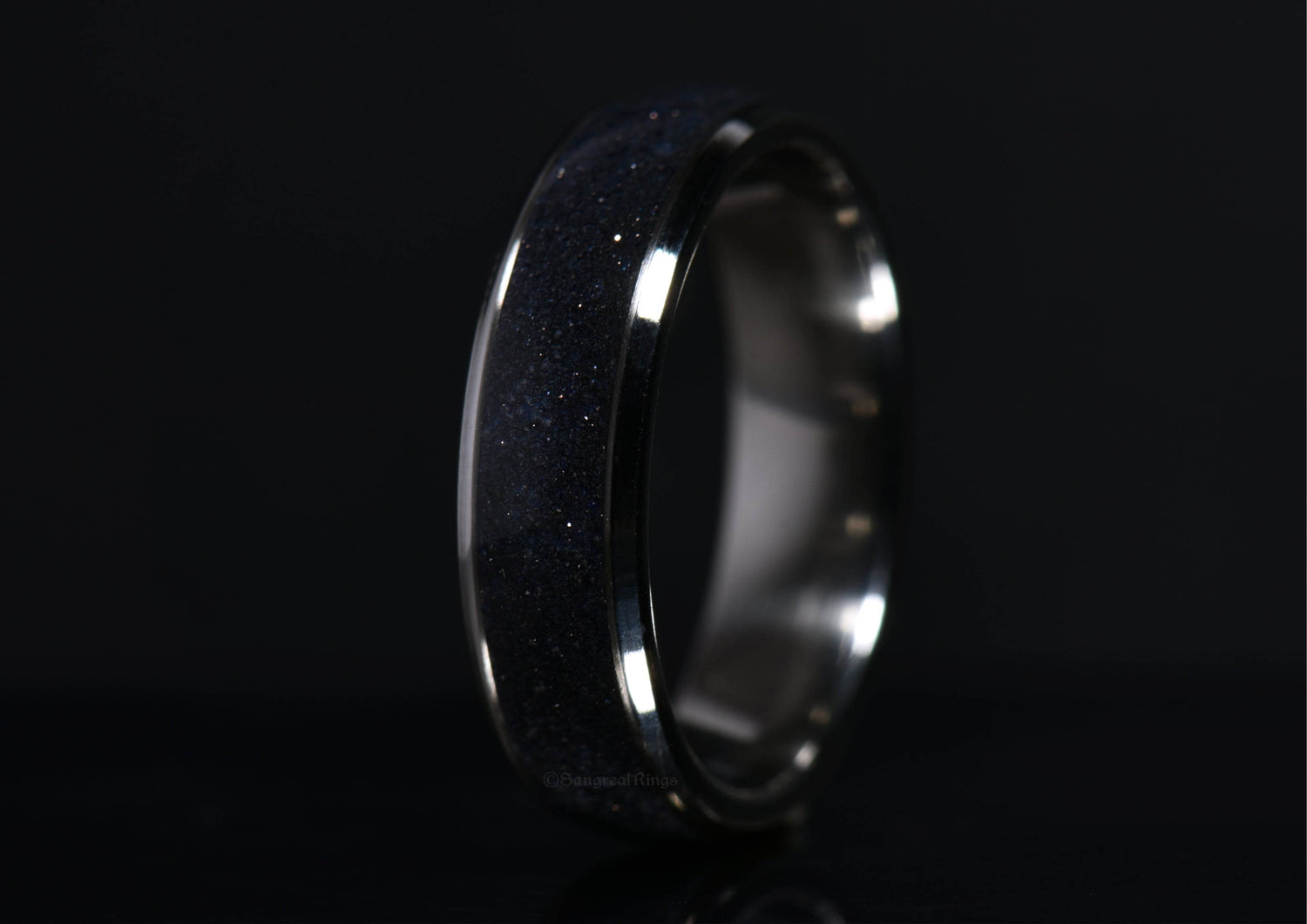 Blue sandstone titanium ring by Sangreal Rings with sparkling crystal inlay on a polished metal band