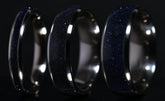Blue sandstone titanium ring by Sangreal Rings with sparkling crystal design and polished finish