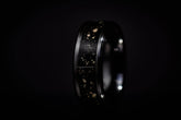 Custom glow in the dark ring by Sangreal Rings with black and speckled design