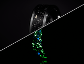 Sangreal Rings custom glow in the dark ring with speckled pattern shown glowing in dark and regular light