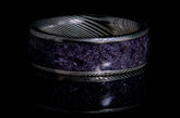 Sangreal Rings Damascus steel amethyst ring with intricate steel patterns and polished amethyst center