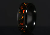 Sangreal Rings onyx and orange opal ring with black band and vibrant orange opal inlay