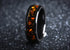 Sleek black onyx and orange opal ring by Sangreal Rings with vibrant orange opal inlay