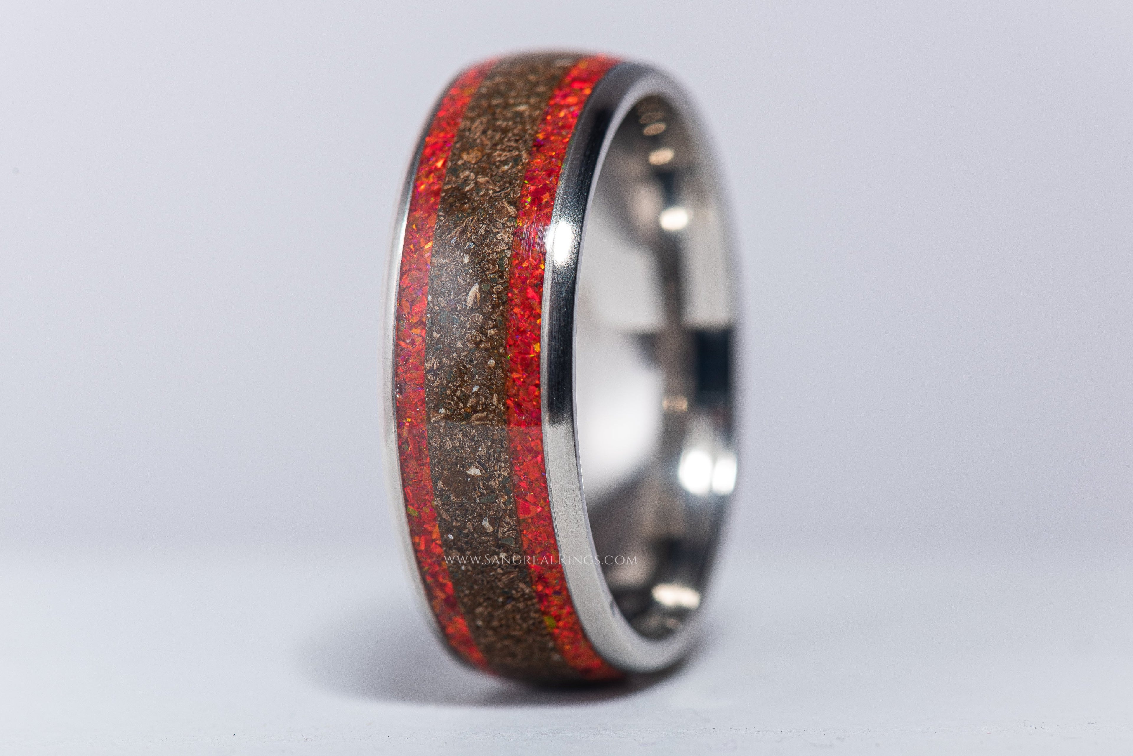 Sleek silver opal and dinosaur bone ring with red and brown inlay by Sangrealrings