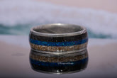 Sangreal Rings Damascus steel sand ring with blue opal and sand inlay and braided steel edges