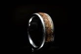 Damascus steel sand ring with textured golden sand inlay and polished steel edges by Sangreal Rings