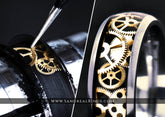 Sangrealrings titanium steampunk ring with visible gold gear inlay and polished brushed edges