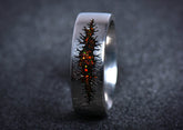 Black titanium band with fiery opal inlay and jagged fissure design unique alternative mens galaxy ring band