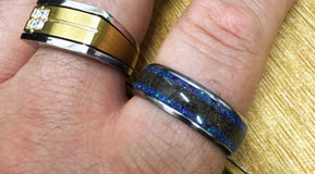 purple opal and megalodon tooth in titanium fossil ring by sangrealrings