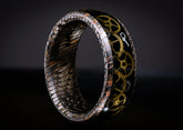 Sangrealrings superconductor steampunk ring featuring intricate gears and a textured metallic band
