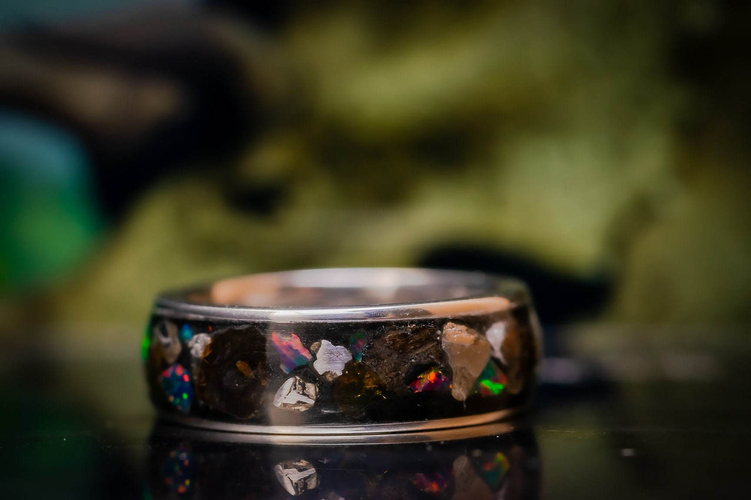 Sangrealrings handmade alternative wedding ring with dark resin inlay and multicolor opal flakes on polished band