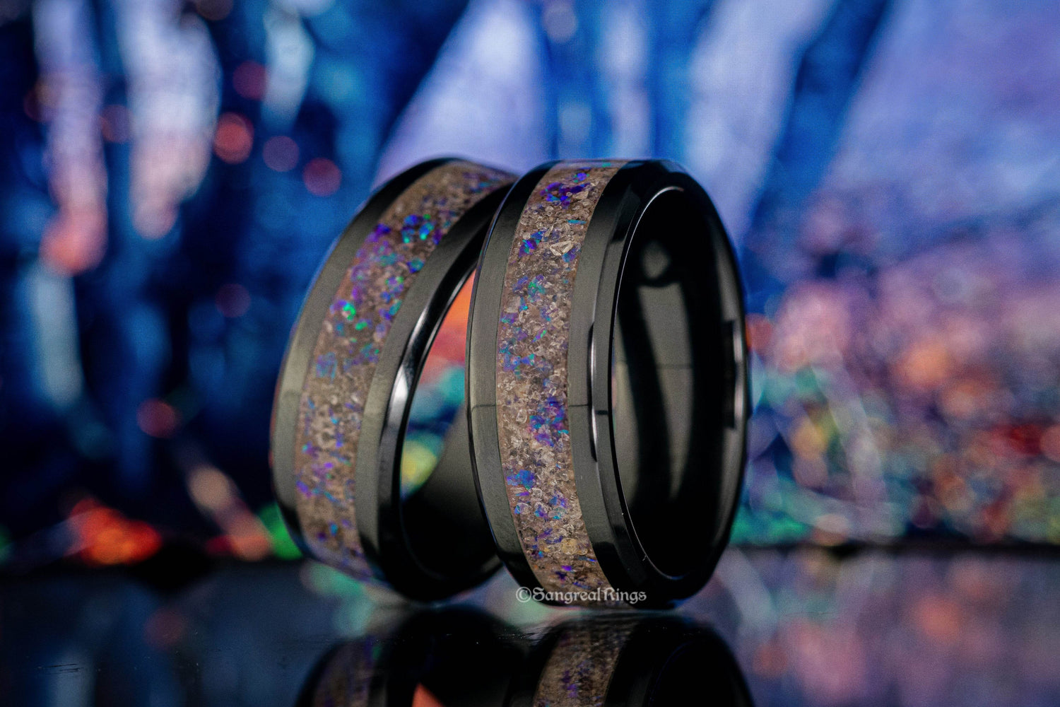 Sangreal Rings black ceramic sand ring with iridescent inlay reflecting blue and purple hues