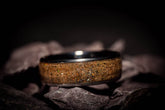 Sangrealrings opal dinosaur bone ring with unique earthy texture on dark background