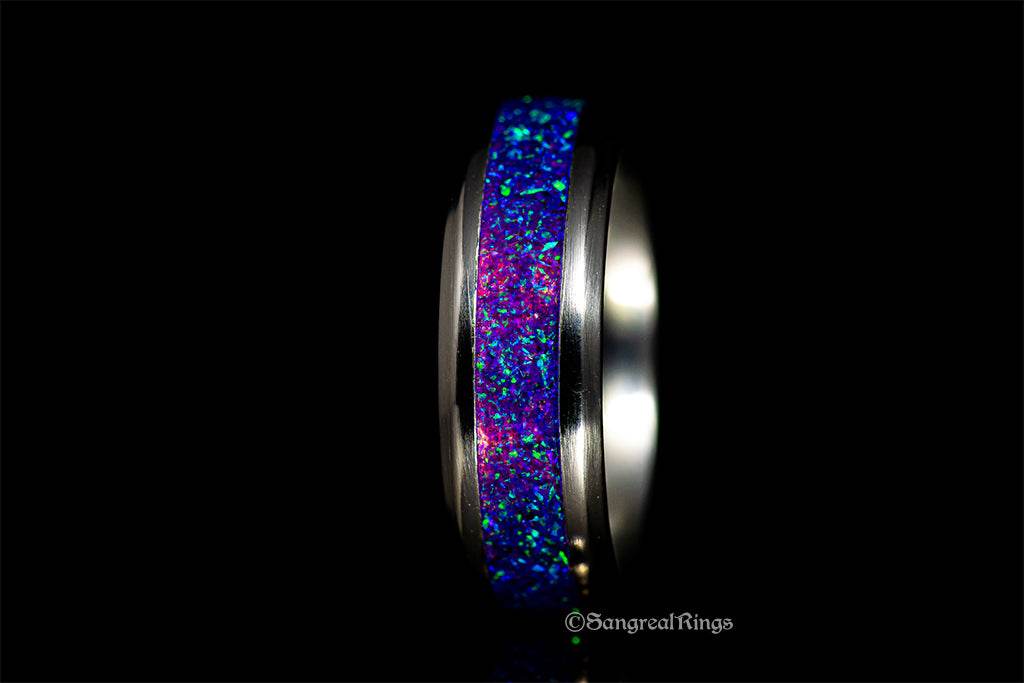 Sangrealrings purple opal titanium ring with vibrant blue and purple opal inlay on a titanium band