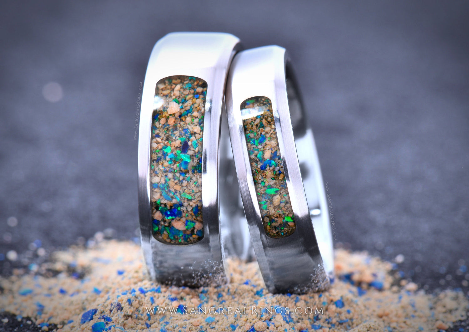 contemporary titanium wedding band set with custom sand and opal inlay by sangrealrings
