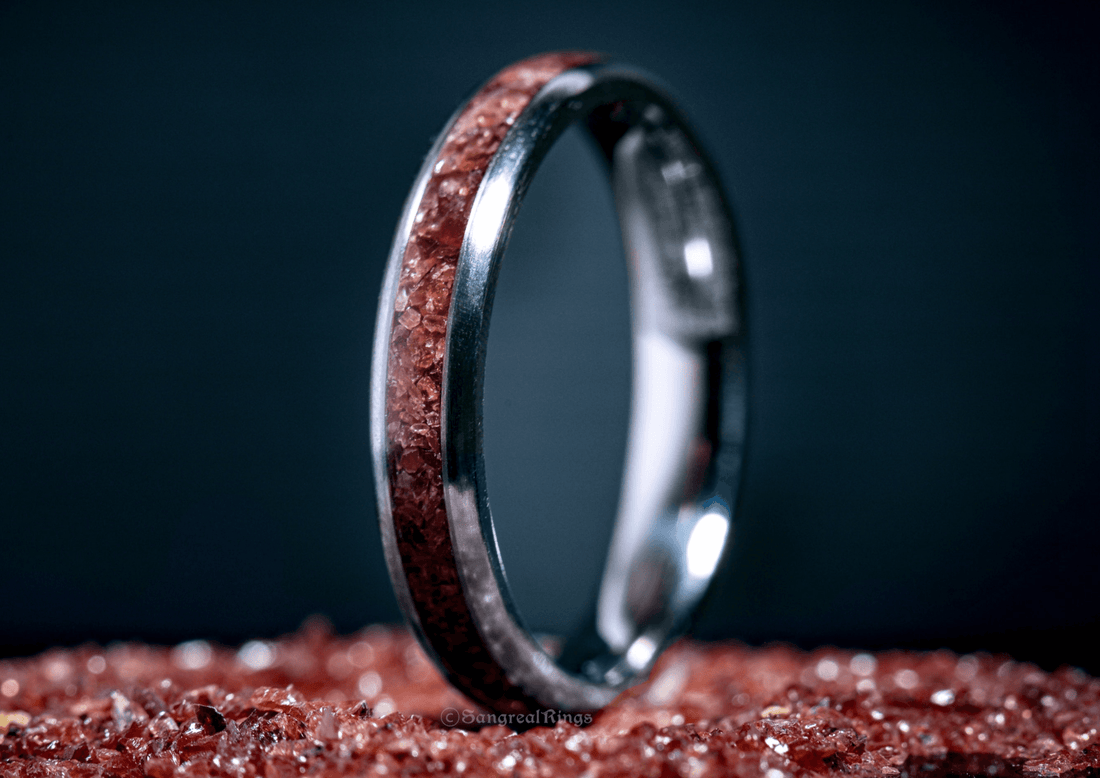Sangreal Rings custom garnet titanium ring with polished silver finish and red garnet inlay