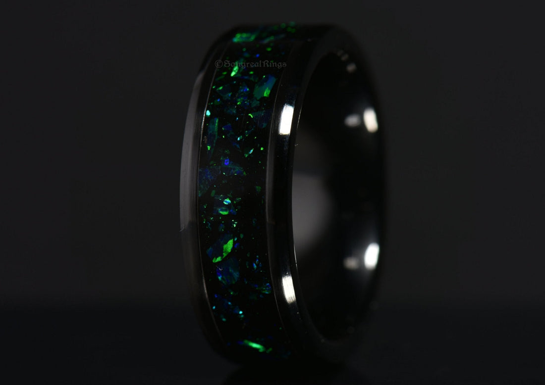 Sleek onyx and green opal ring by Sangreal Rings with vibrant green and blue opal inlay