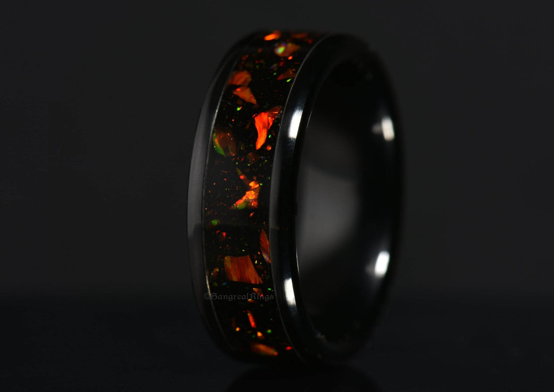 Sangreal Rings onyx and orange opal ring with black band and vibrant orange opal inlay