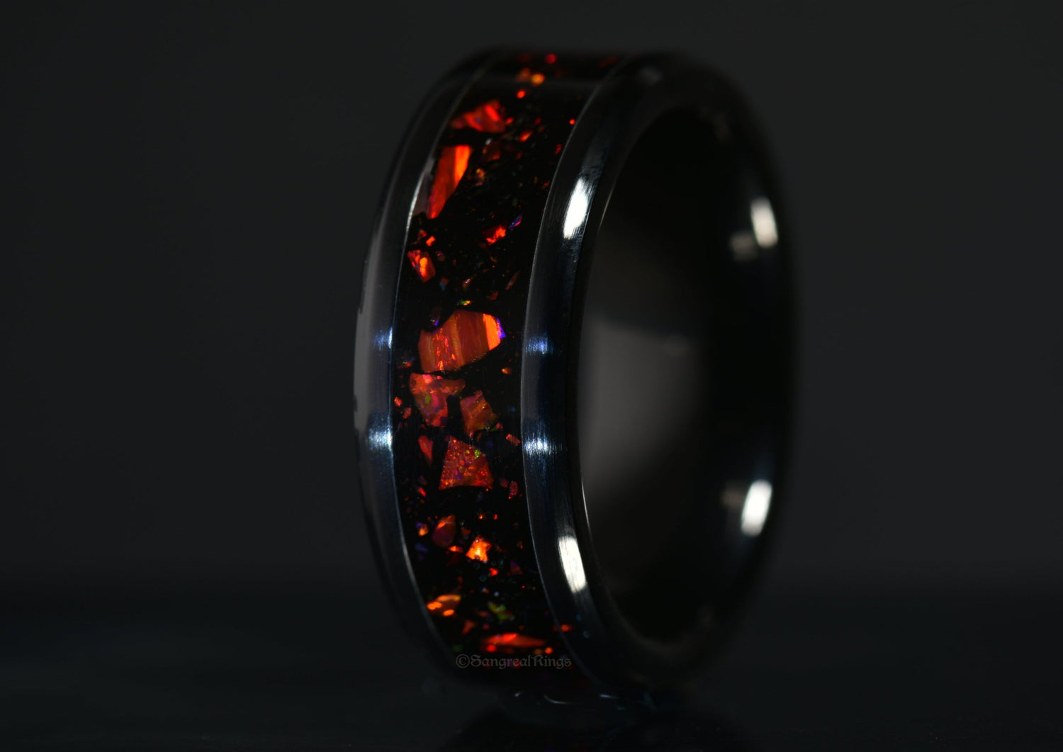 Sangreal Rings onyx and red opal ring with black band and vibrant red opal inlay design