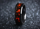 Sleek onyx and red opal ring by Sangreal Rings with vibrant fiery red opal inlay on black band
