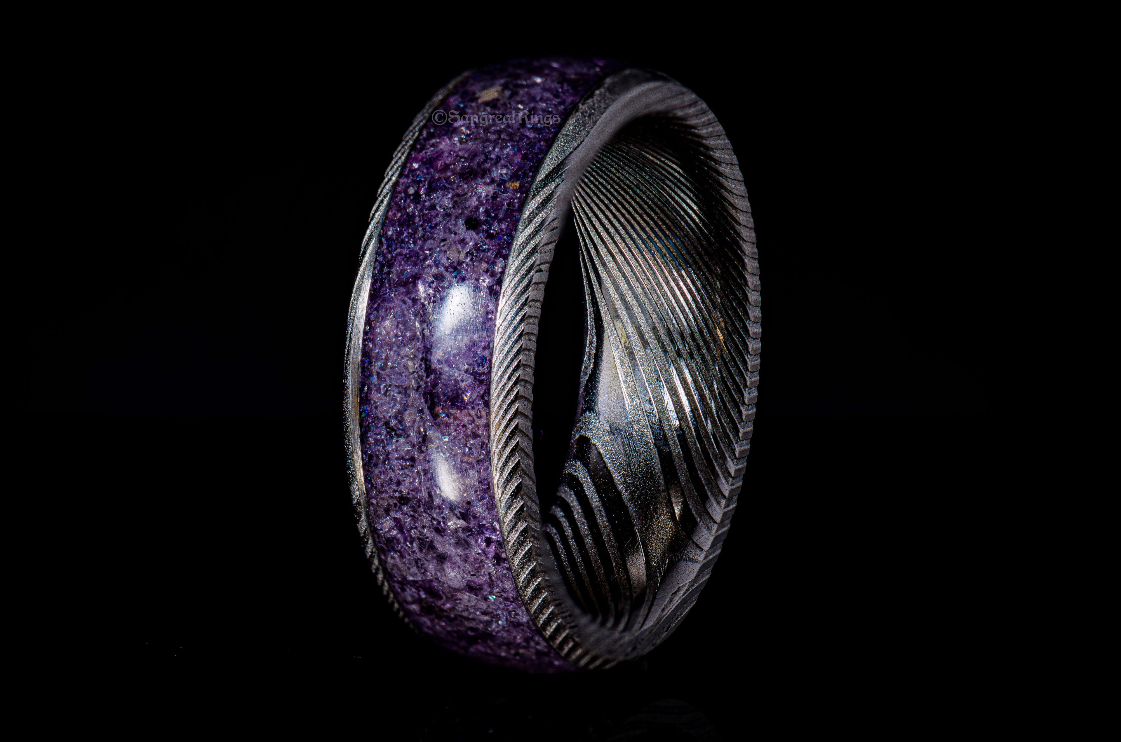 damascus steel ring with purple inlay
