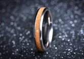 Sleek titanium sand ring by Sangreal Rings with smooth metallic finish and sandy inlay