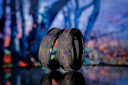Sangreal Rings black ceramic sand ring with iridescent inlay reflecting blue and purple hues