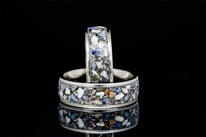 Memorial ring with ashes by Sangrealrings featuring unique inlaid ashes and colorful details on silver band