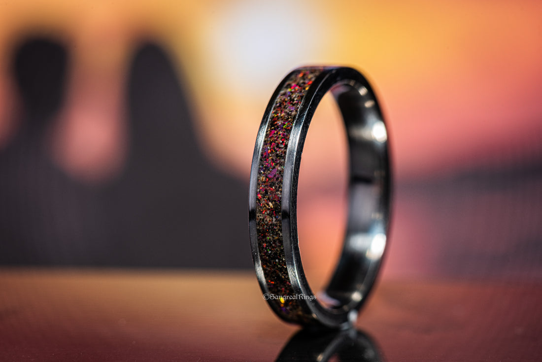 Sangreal Rings titanium sand ring with shimmering red and gold sand inlay on black band